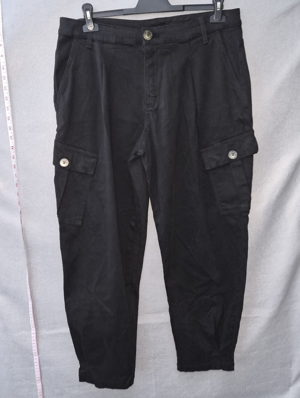Versatile black cargo pants by AMADI, Size L  Made in USA.